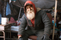 Homeless man with shelter